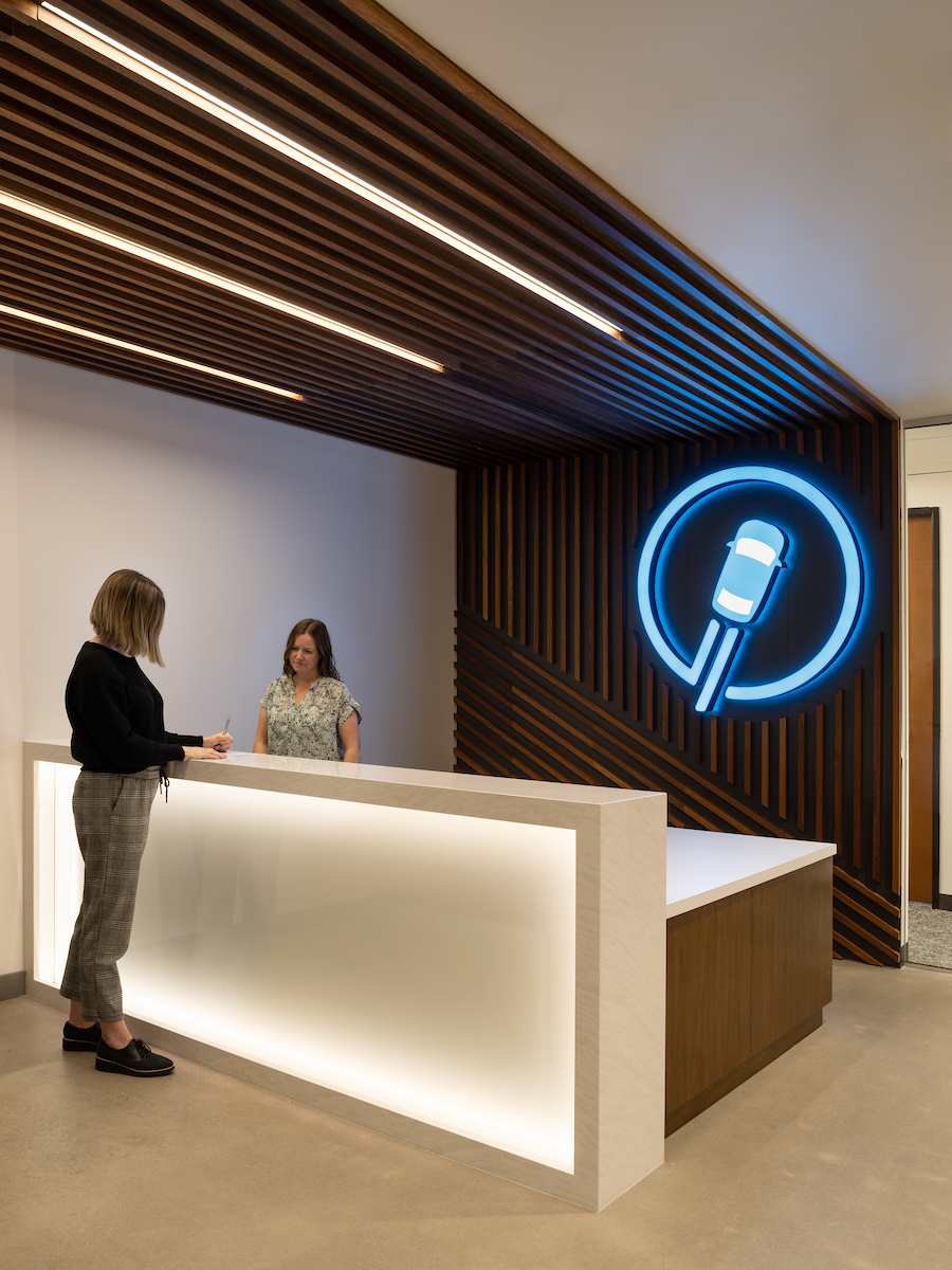 MKNZE_Lithia-1 Modern reception area with neon sign