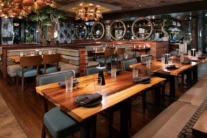 Handcrafted sustainable wood tabletops, designed for hospitality and commercial spaces.